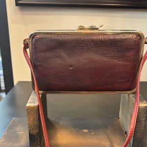 Bugatti Burgundy Leather Frame Clutch with Gold Trim